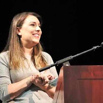 Woman at podium