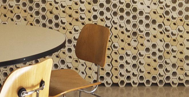 Chair in front of a honeycomb wall